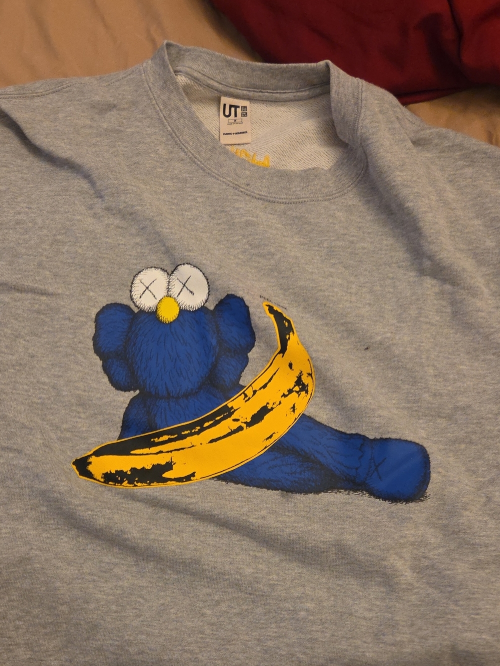 Uniqlo Gray Kids Sweatshirt with Blue Character and Yellow Banana Graphic
